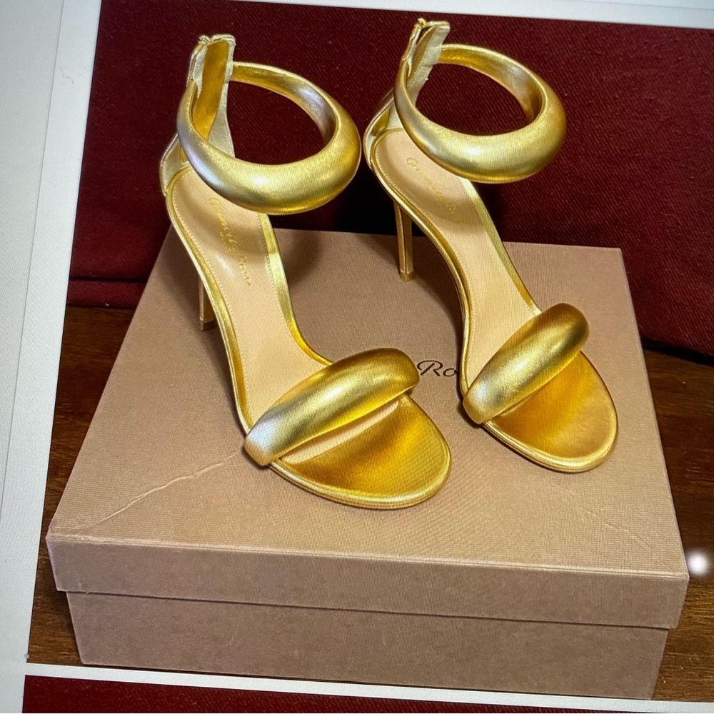 Gianvito Rossi’s Bijoux sandals are crafted of metallic leather and showcase.